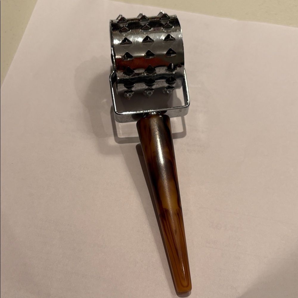 Vintage meat tenderizer bakelite handle